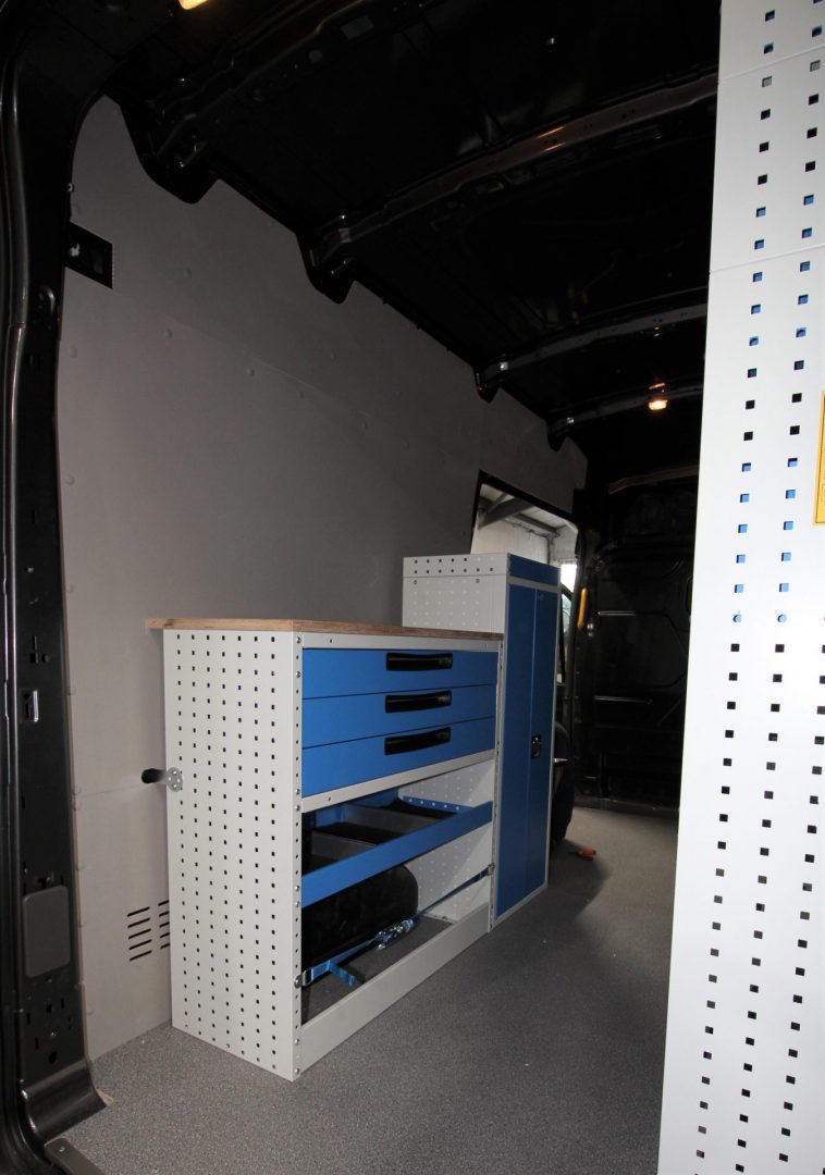 ford transit racking with locker and workbench on left side