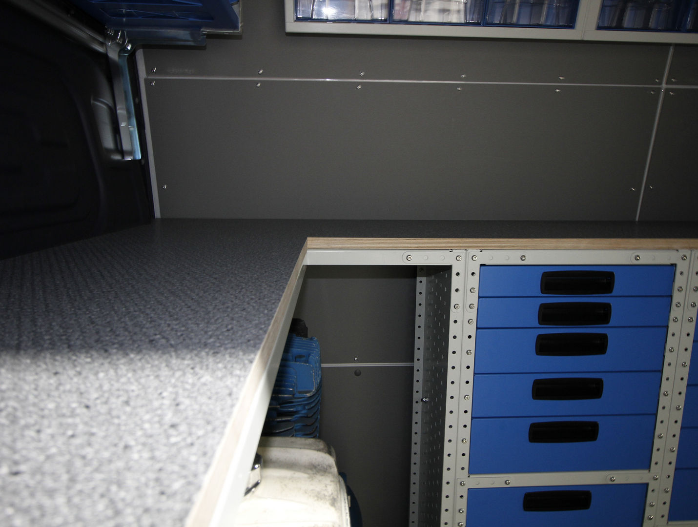 van racking wrap around workbench for recovery vehicle