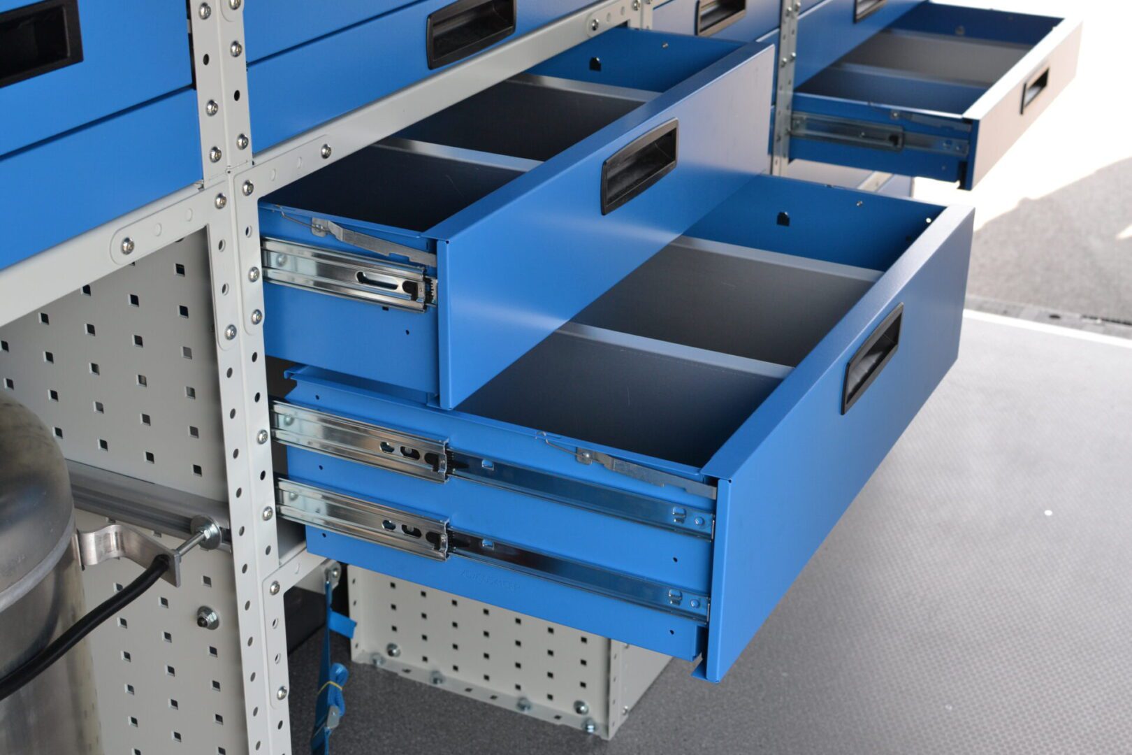 MAN van racking system for mechanic view steel drawers in open position