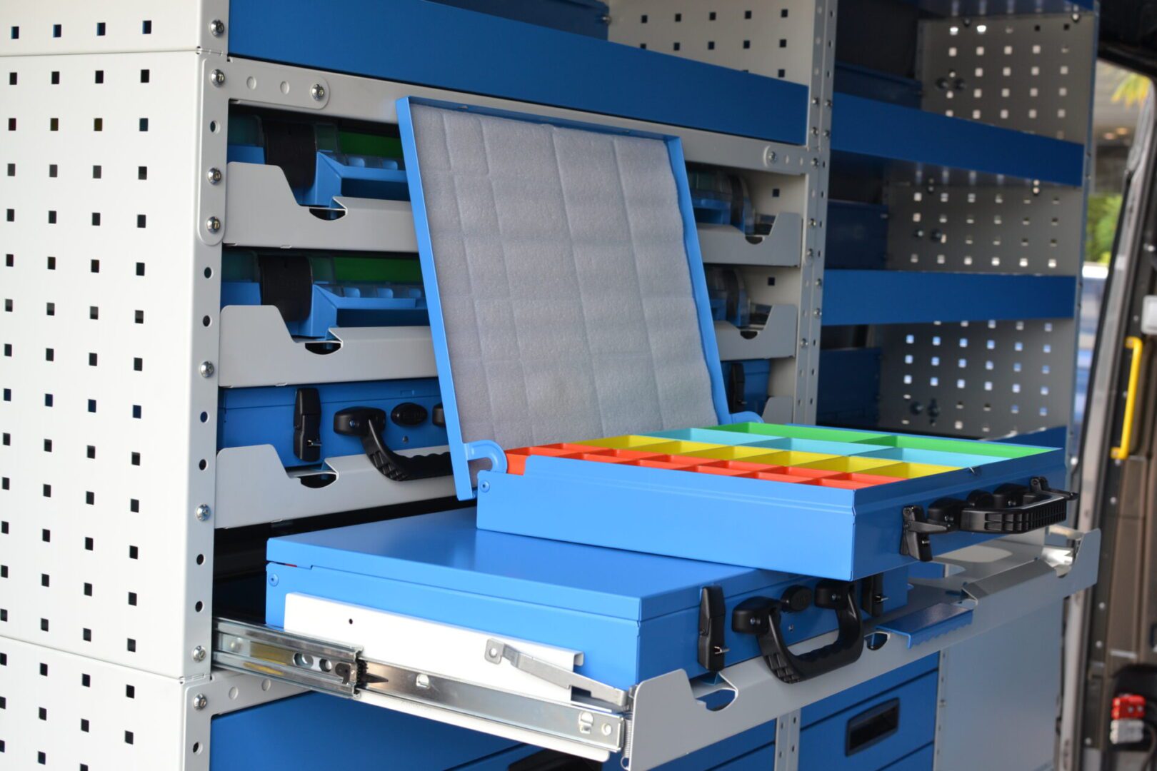 MAN van racking system view metal parts case open with coloured mini bins
