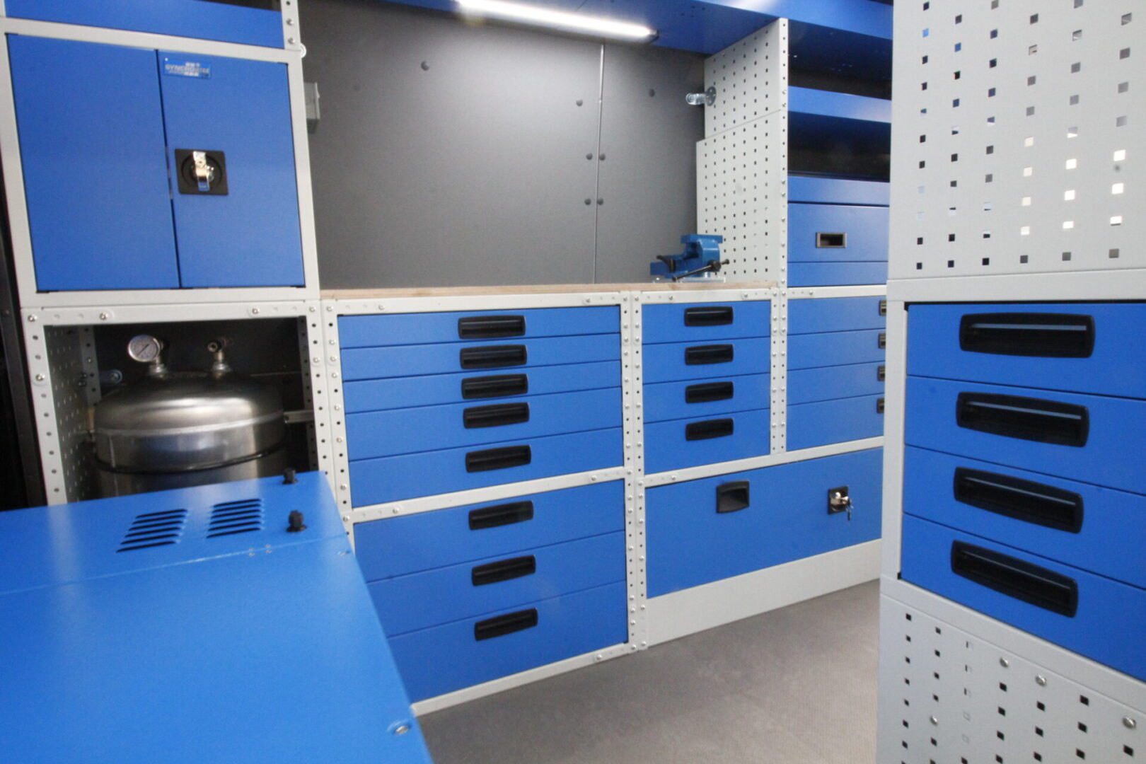 workbench area with a bench vice in racking design for man van